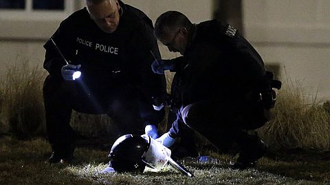 Two Officers Shot Outside Ferguson Police Headquarters after Chief Quits