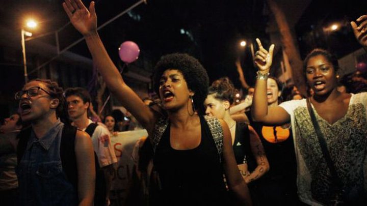 Protesters in Rio, demanding reforms including better protection from male violence ..