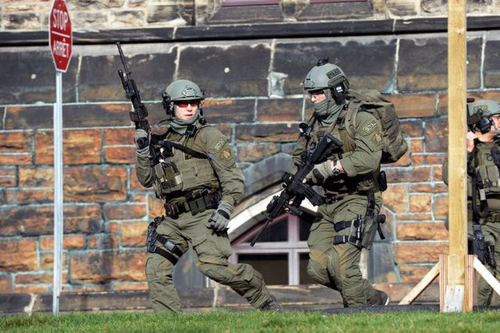 Members of the Royal Canadian Mounted Police at the Parliament building on Wednesday.