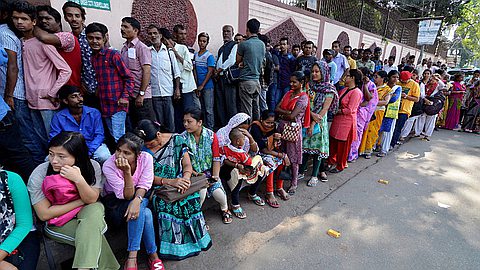 Narendra Modi Defends Currency Move as Millions in India Scramble for Cash