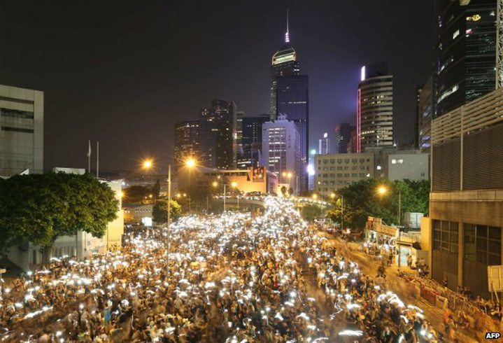 Protesters remained on the streets as darkness fell on Monday, with many still camped outside ..