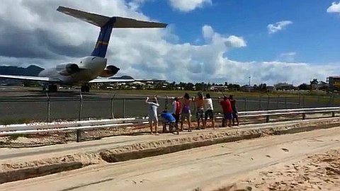 Video of the Day: People on The Beach vs Plane Engine