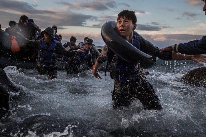 Migrants from Turkey landing on Lesbos in October after battling rough seas