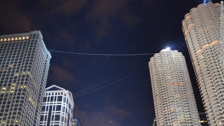 Aerialist Nik Wallenda traversed this wire Sunday above downtown Chicago. 