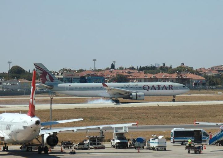 A Qatar Airways aircraft is seen after making an emergency landing at Ataturk International Airport 