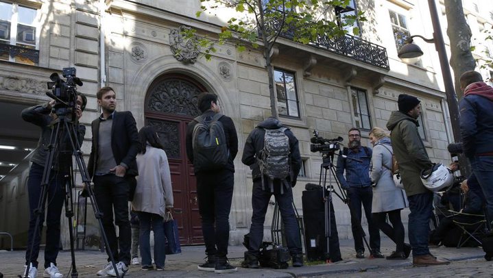 Journalists outside the building where Kim Kardashian was staying