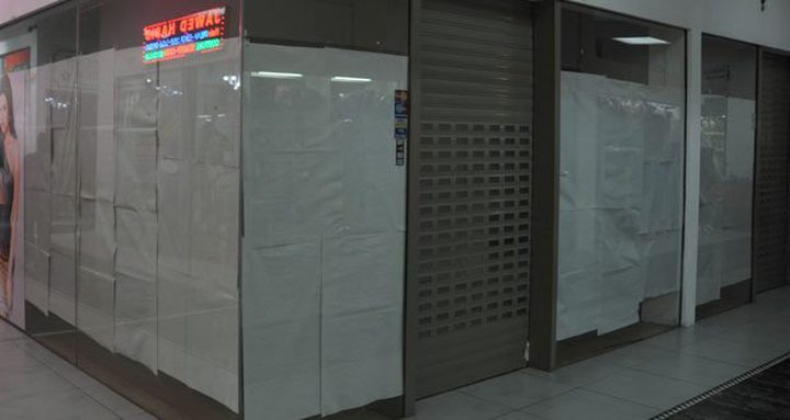 Archive Photo: Closed shop in Port Louis