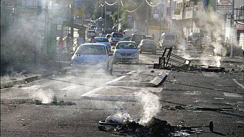 Reunion: Agree Price Decline After Violence