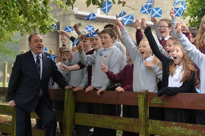 Scotland's First Minister Alex Salmond meets with pupils at a school in Strichen, near Aberdeen