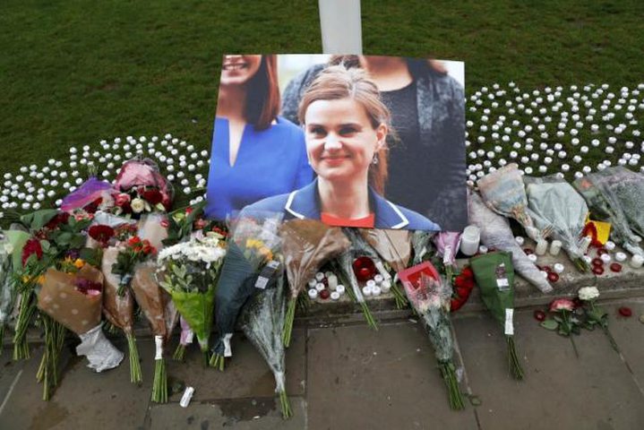 Tributes and candles left for murdered Labour Member of Parliament Jo Cox are seen in Parliament...