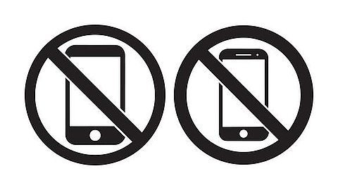Mobile phones are now banned in schools except in exceptional circumstances