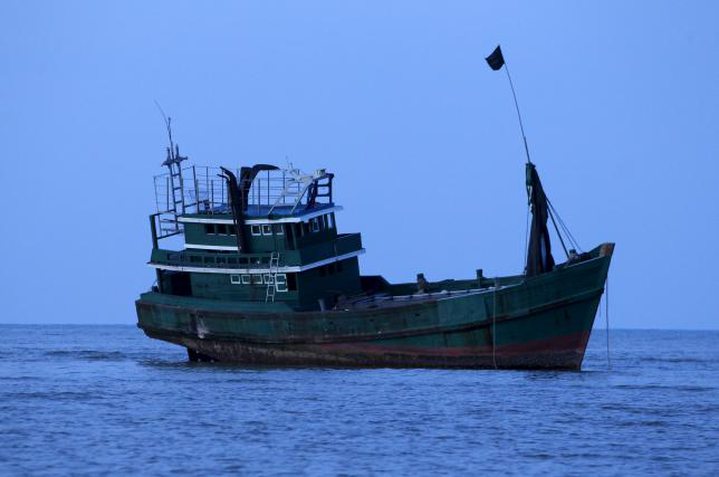 Abandoned boat which carried Rohingya and Bangladeshi migrants from Thailand is found off the coast 