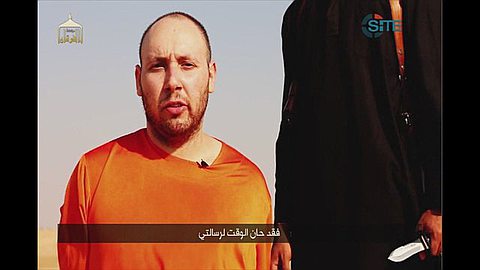 Obama Says Beheading Shows Need for International Action