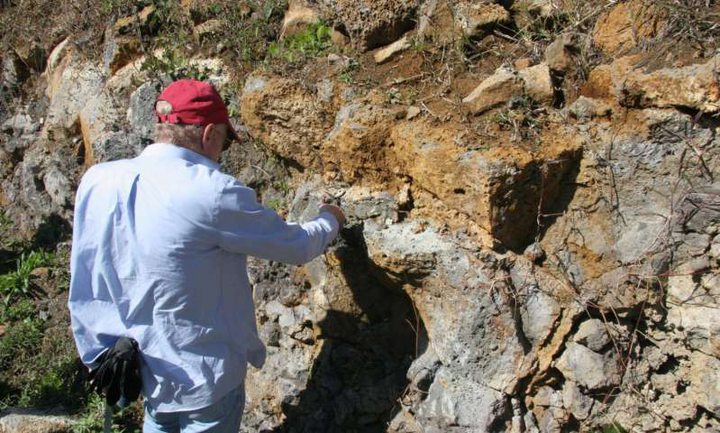 Lead author Prof. Lewis D. Ashwal studying an outcropping of trachyte rocks in Mauritius