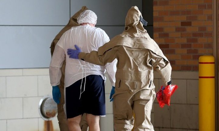 A possible Ebola patient is brought to the Texas Health Presbyterian hospital in Dallas.