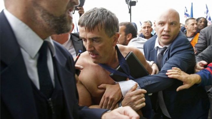 Xavier Broseta had to be escorted away from the protesters