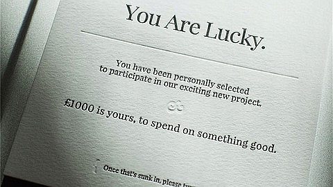 Meet the Businessman Who Hands Out £1,000 to Complete Strangers