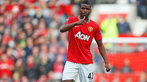 Paul Pogba joins Manchester United for world-record £89m