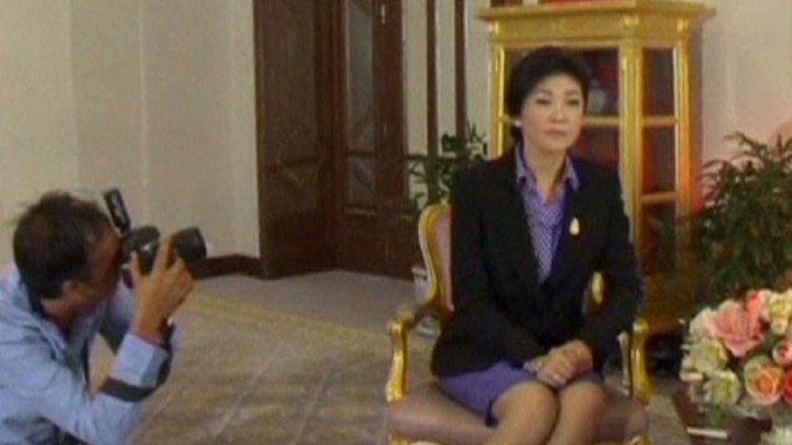 Amid Protests, Thailand's PM Yingluck Shinawatra..