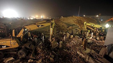 Workers Trapped in Collapsed Pakistan Factory Plead for Help on Mobile Phones