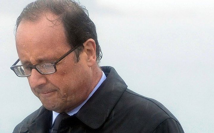 President Hollande Struggles to Form New...
