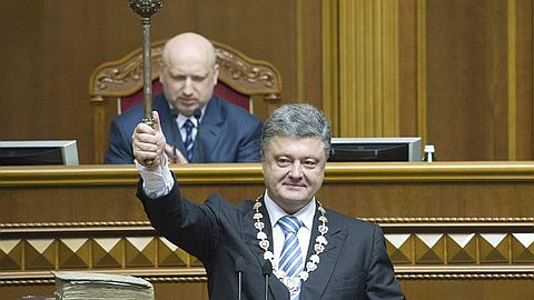 Poroshenko Takes Ukraine Helm With Tough Words for Russia