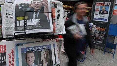 Gloves off in French election as Le Pen aide slams Macron