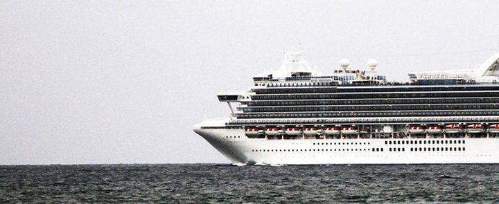 A Carnival Corporation cruise ship is seen off the beach at Fort Lauderdale, Fla. on Feb. 5, 2012.