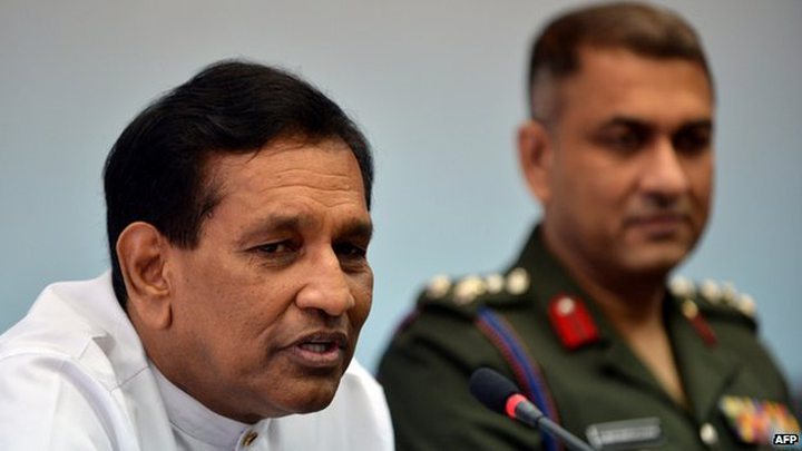 Mr Senaratne (left) said that the outgoing president was seeking military intervention 'right up to 