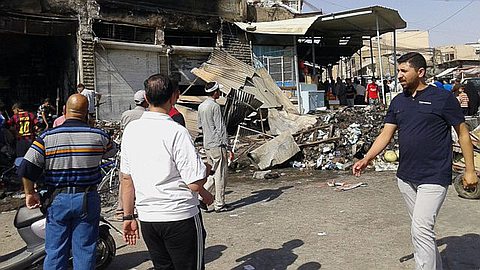 Iraqi Forces Clash With Militants in Northern City