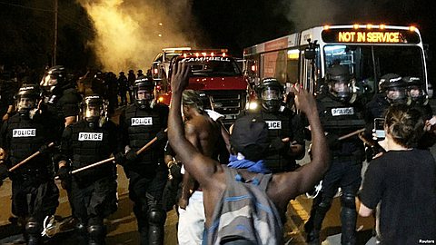 Protesters march for third night in Charlotte, defying curfew