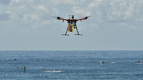 A drone has rescued two people from rough seas off the coast of Australia